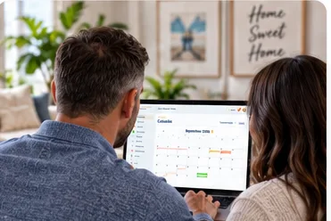 Homeowners looking at their calendar together